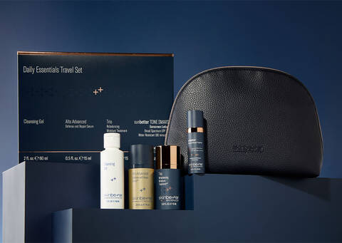 SilkNova daily essentials travel kit including deluxe size products, a travel pouch, displayed on a shelf with dark navy background